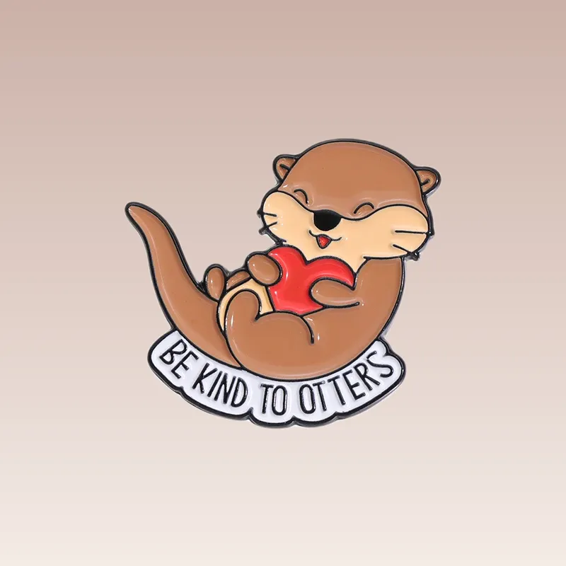 Découvrez le Pin's Animaux - Gentille Loutre, un accessoire adorable à ajouter à votre collection. Commandez-le dès maintenant et affichez votre amour pour la nature !