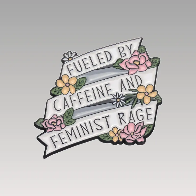 Découvrez les pins Féministe - Caffeine Junky, l'accessoire parfait pour affirmer votre style engagé. Commandez le vôtre maintenant !