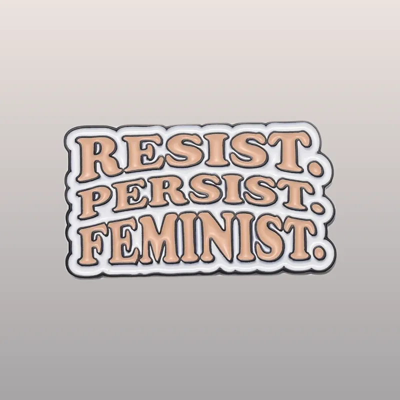 Découvrez nos pins Féministe - Resist pour afficher vos valeurs avec style. Parfaits pour personnaliser vos vêtements et promouvoir l'égalité, achetez-les dès maintenant !